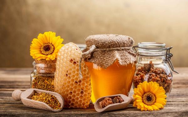 قیمت عسل طبیعی با موم + خرید و فروش
